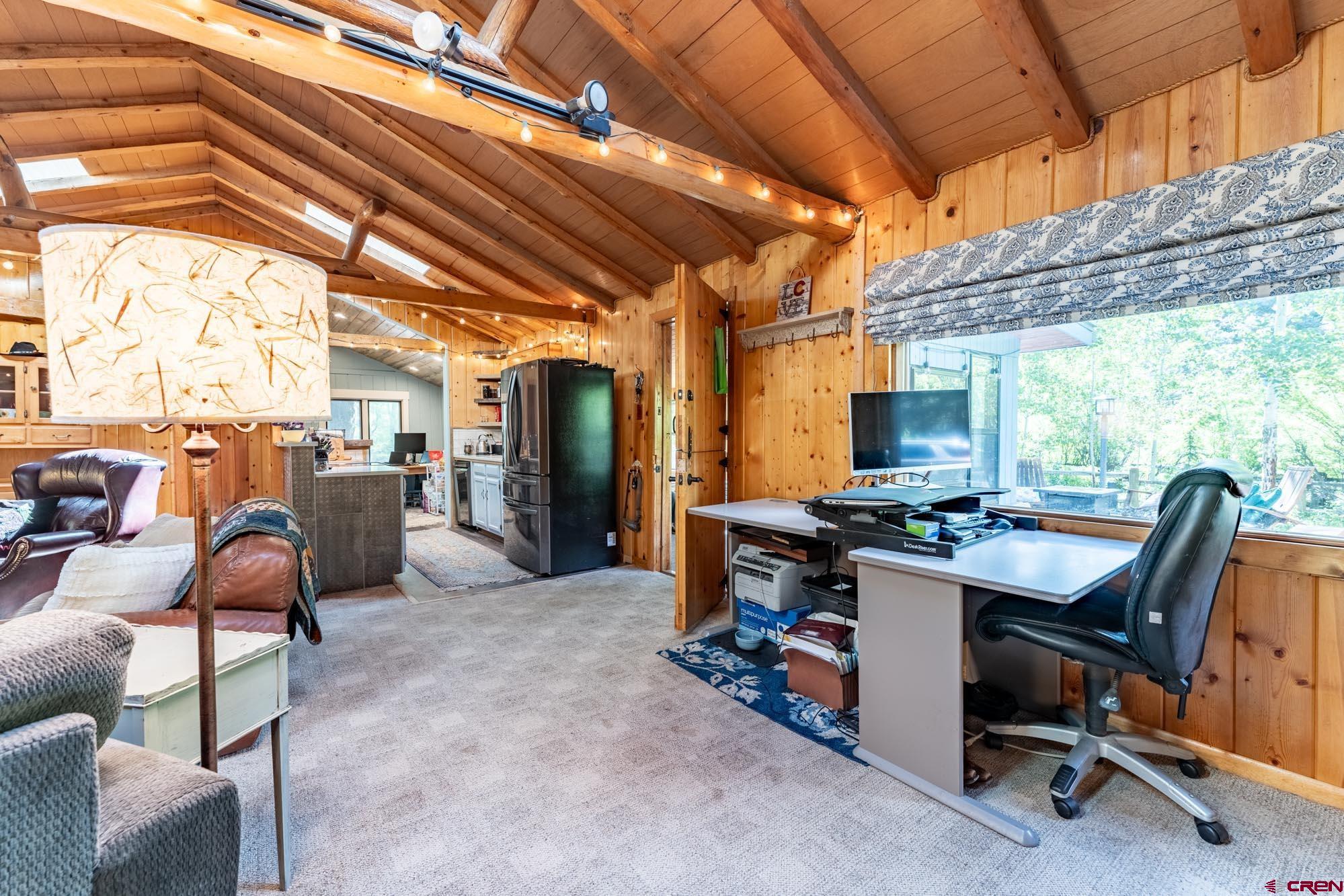 95 Deerpath Lane, Unit RIVERFRONT Almont, CO 81210 - Photo 28 of 35 a view of a work space with furniture and a window