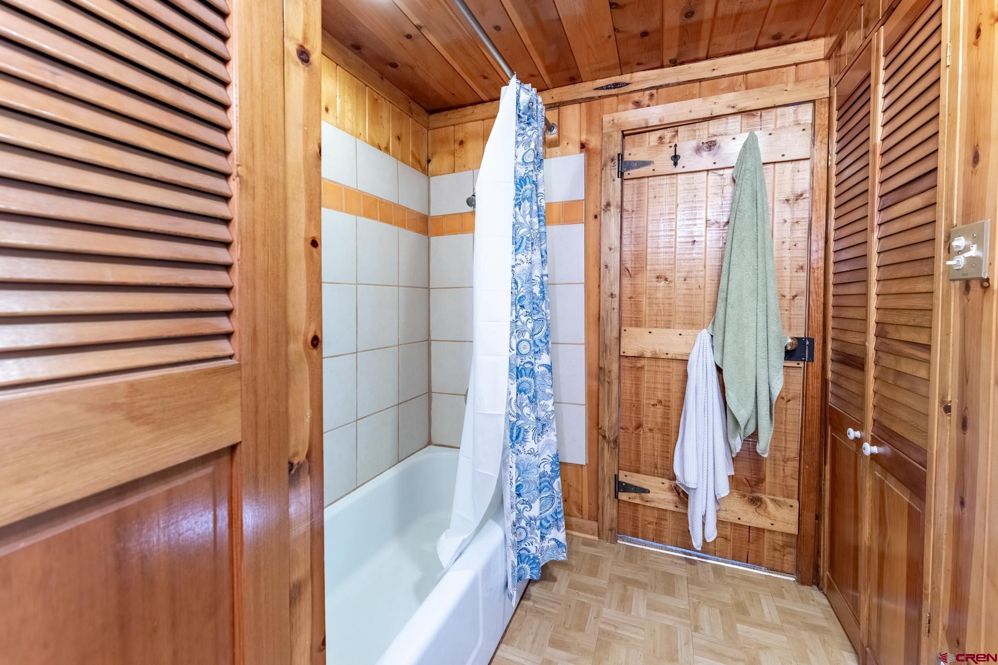 95 Deerpath Lane, Unit RIVERFRONT Almont, CO 81210 - Photo 34 of 35 a view of bathroom with tub and shower