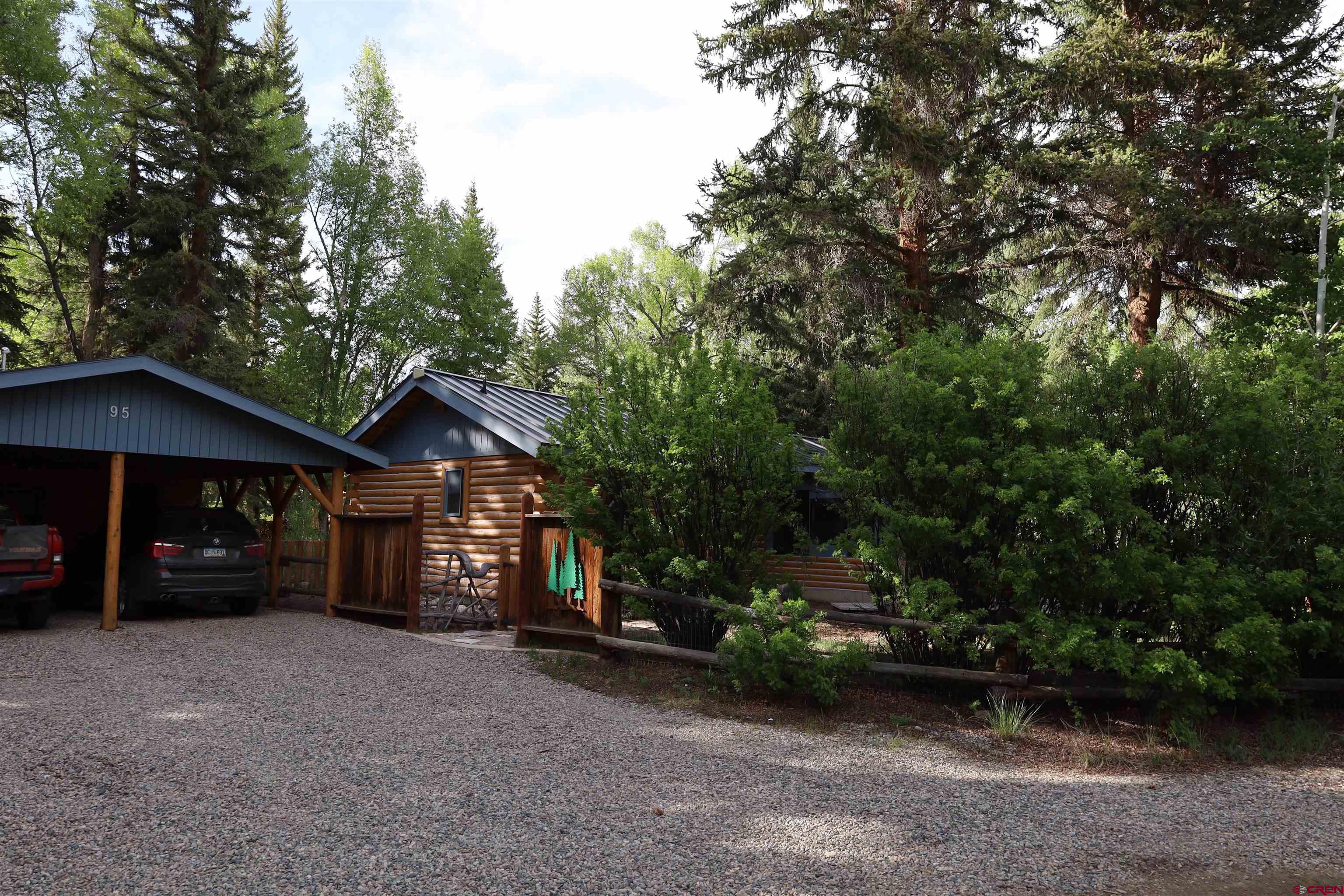 95 Deerpath Lane, Unit RIVERFRONT Almont, CO 81210 - Photo 6 of 35 a view of a car in front of house