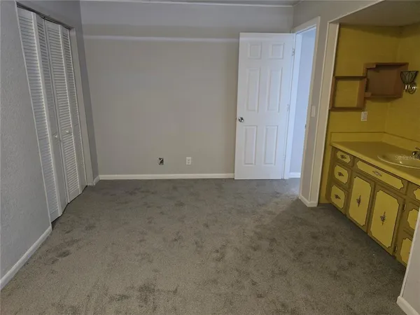 a view of a utility room with a sink