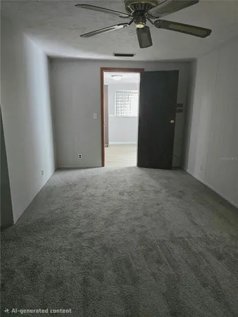 a view of a livingroom with a ceiling fan