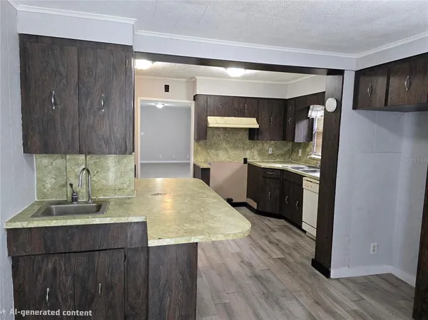 a kitchen with stainless steel appliances granite countertop wooden cabinets a sink and a stove