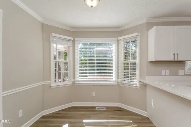 a view of empty room with a window