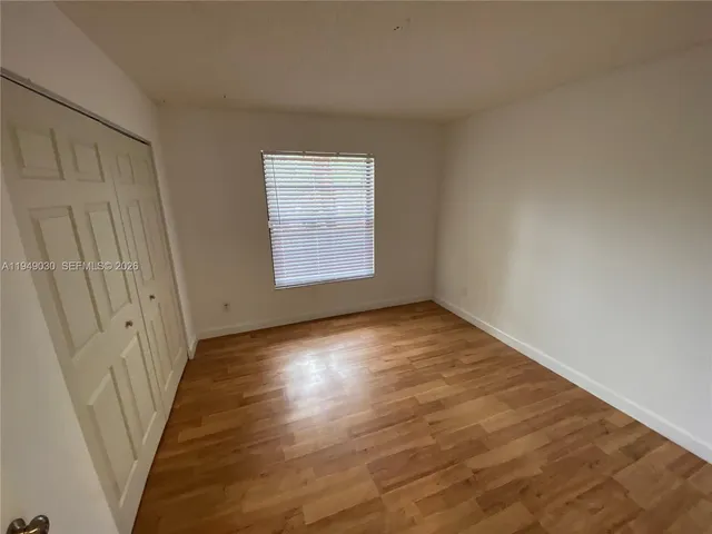 a view of balcony with furniture