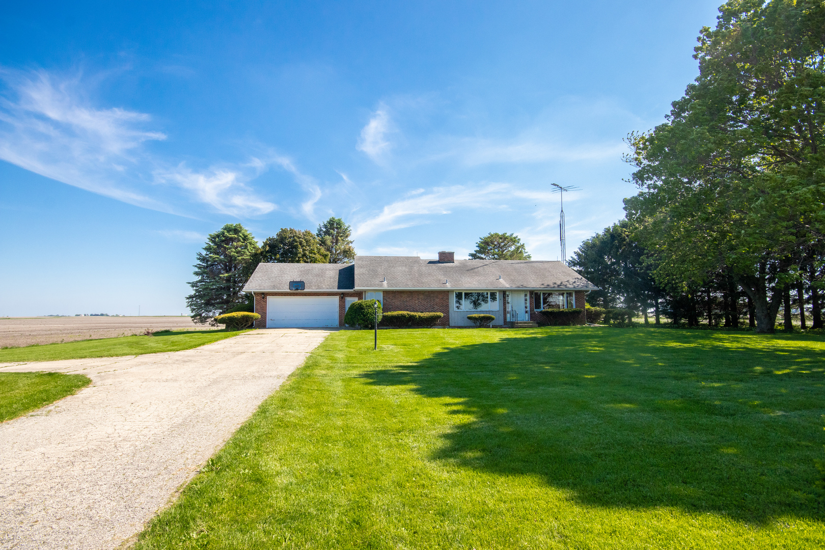 9096 Wesson Road Leland, IL 60531 - Photo 2 of 29 a front view of a house with a yard