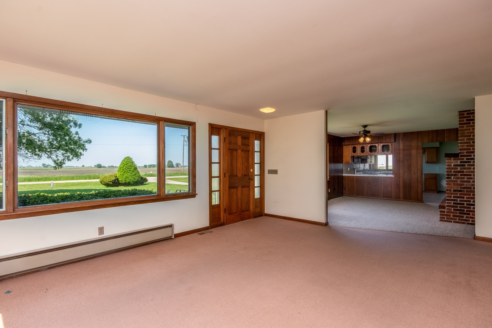 9096 Wesson Road Leland, IL 60531 - Photo 13 of 29 a view of an empty room with a floor to ceiling window and an outdoor space
