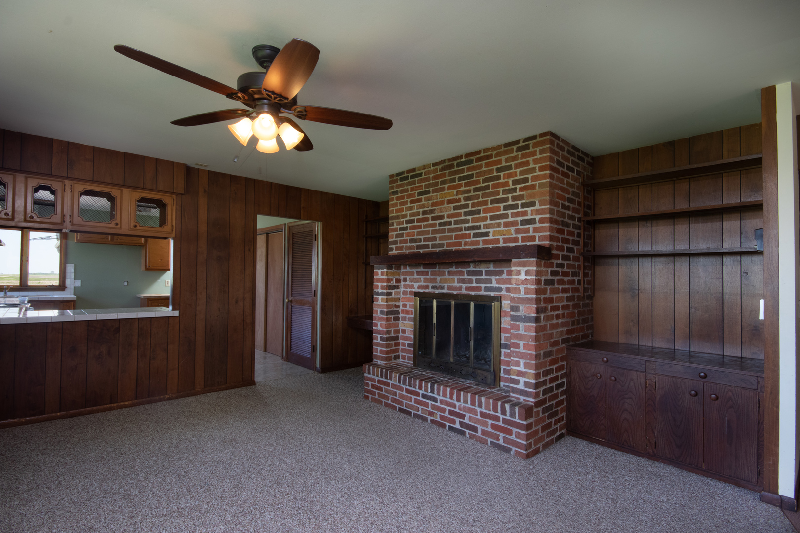 9096 Wesson Road Leland, IL 60531 - Photo 15 of 29 a living room with furniture and a fireplace