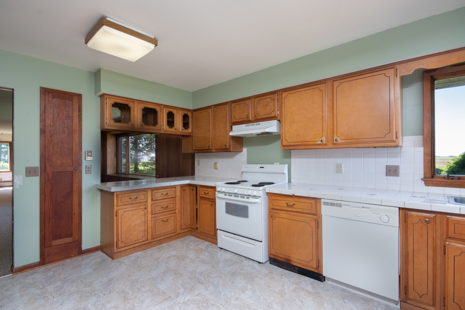 9096 Wesson Road Leland, IL 60531 - Photo 17 of 29 a kitchen with stainless steel appliances granite countertop a stove and cabinets
