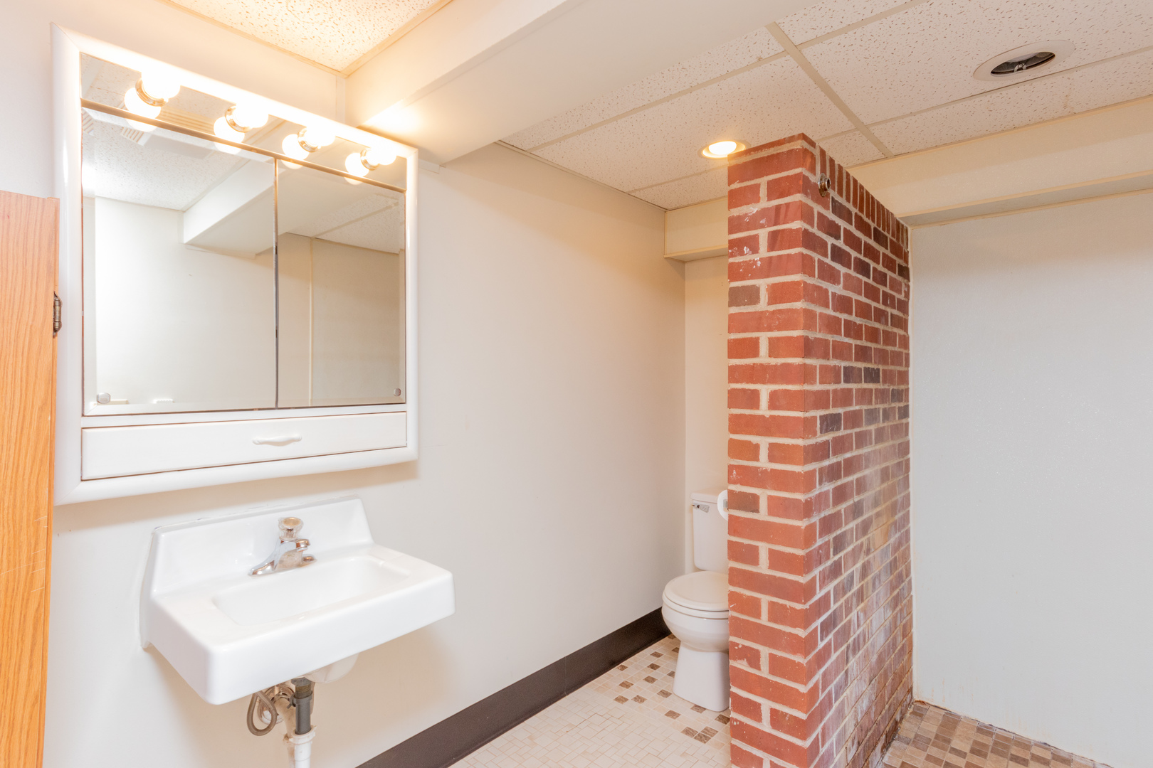 9096 Wesson Road Leland, IL 60531 - Photo 27 of 29 a bathroom with a sink and a mirror