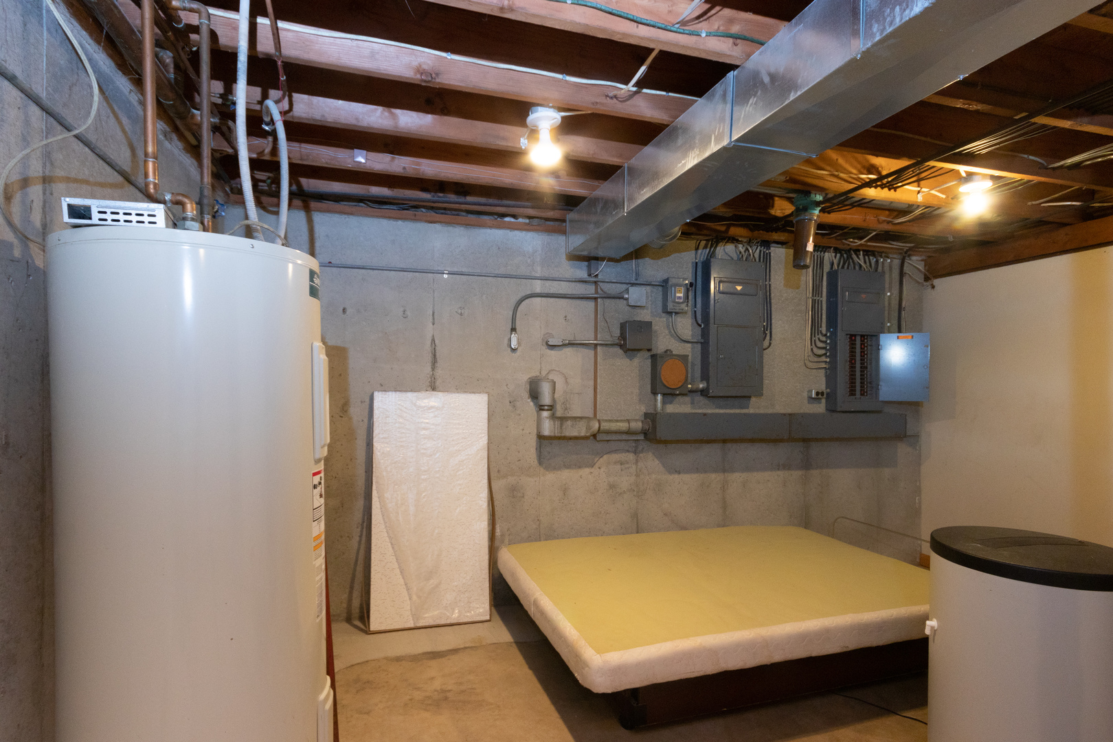 9096 Wesson Road Leland, IL 60531 - Photo 29 of 29 a room with water heater and storage