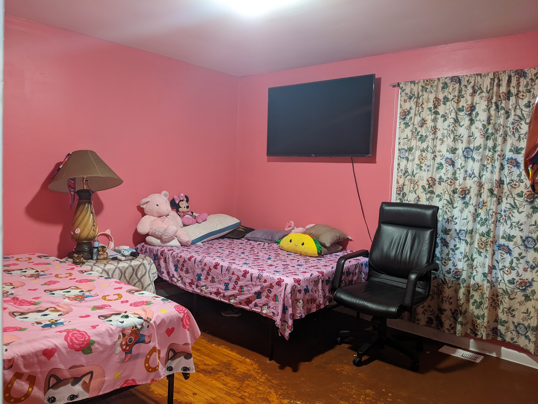 700 Blackstone Avenue Madison, TN 37115 - Photo 5 of 15 a bedroom with two beds and a flat screen tv