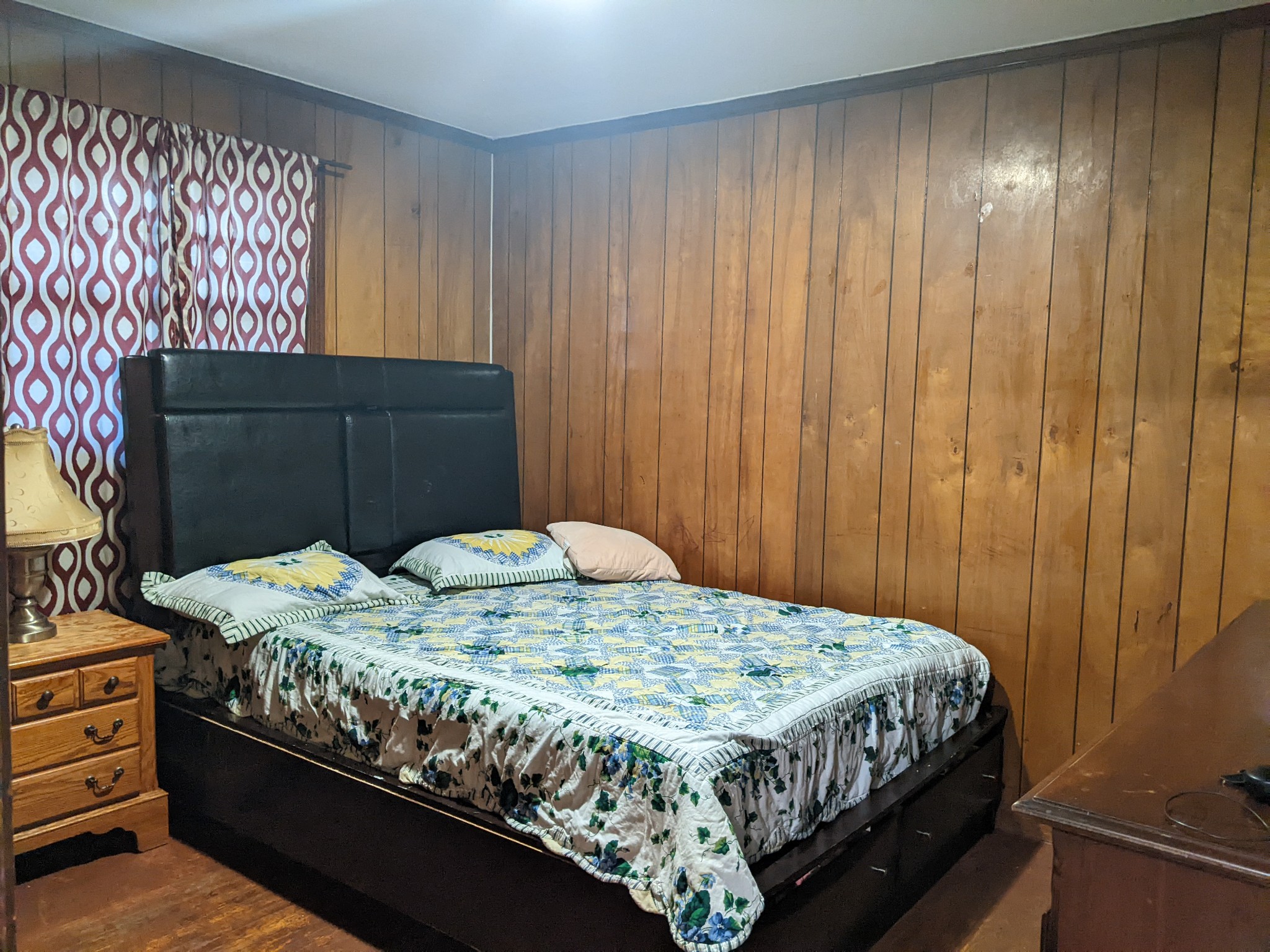 700 Blackstone Avenue Madison, TN 37115 - Photo 6 of 15 a bed sitting in a bedroom next to a window