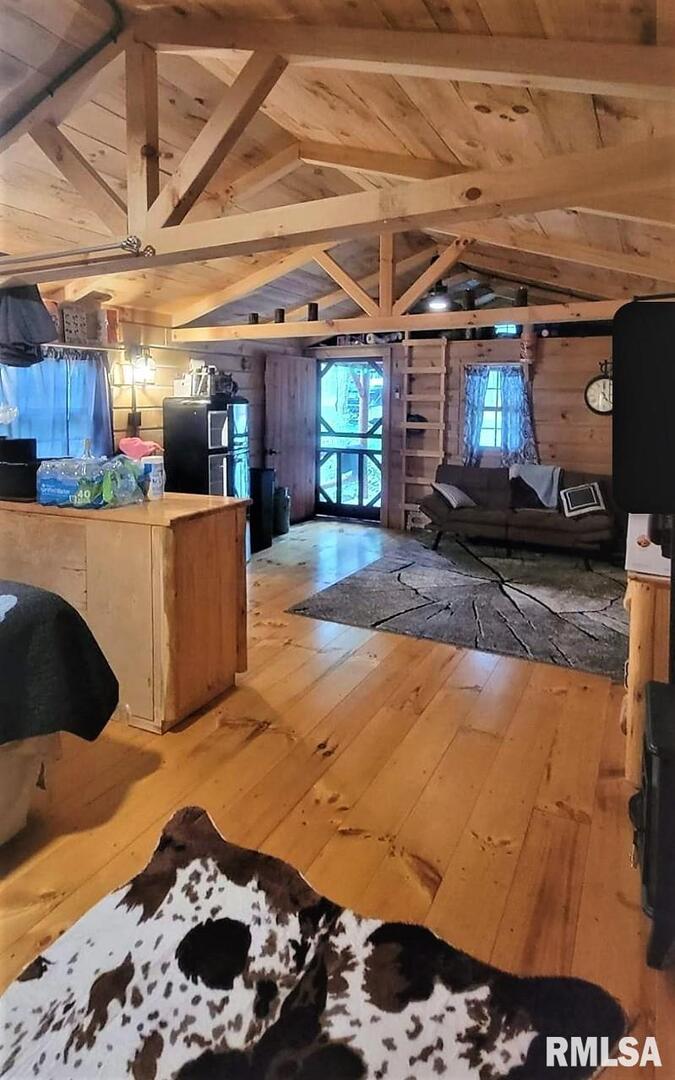 67 Dutchman Trail Ozark, IL 62972 - Photo 4 of 14 a living room with furniture and a chandelier