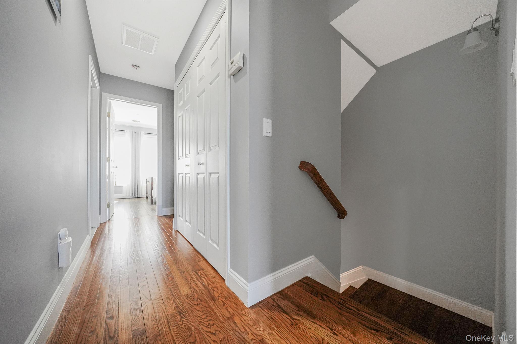531 Ray Street, Unit 10 Freeport, NY 11520 - Photo 23 of 32 a view of entryway with wooden floor