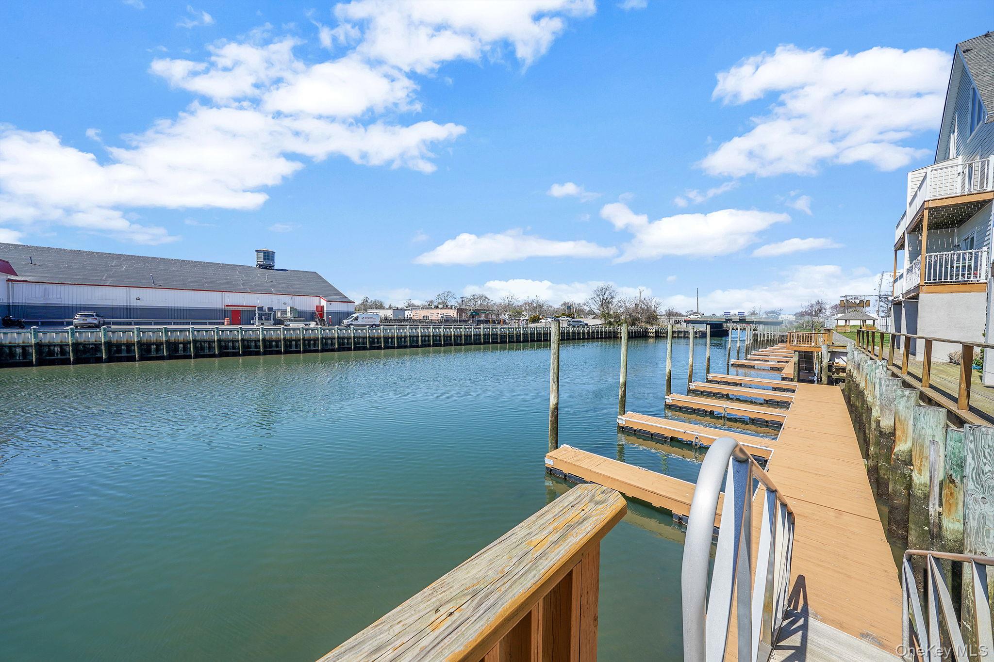 531 Ray Street, Unit 10 Freeport, NY 11520 - Photo 28 of 32 a view of a lake with sitting area