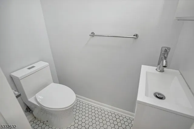 a bathroom with a sink and a toilet