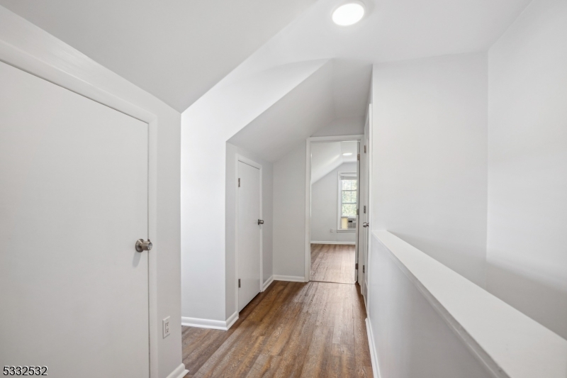 60 2nd Street South Orange, NJ 07079 - Photo 15 of 19 a view of a hallway with wooden floor