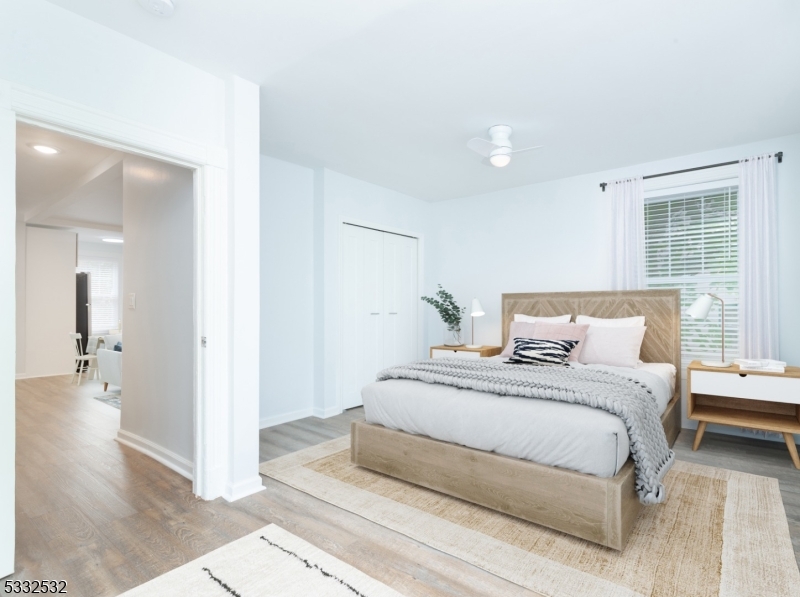 60 2nd Street South Orange, NJ 07079 - Photo 7 of 19 a large white bed in a white room