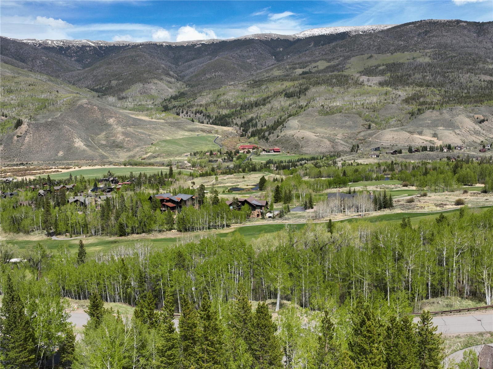 2635 Hunter's Knob Road Silverthorne, CO 80498 - Photo 9 of 12 a view of a lush green hillside and houses