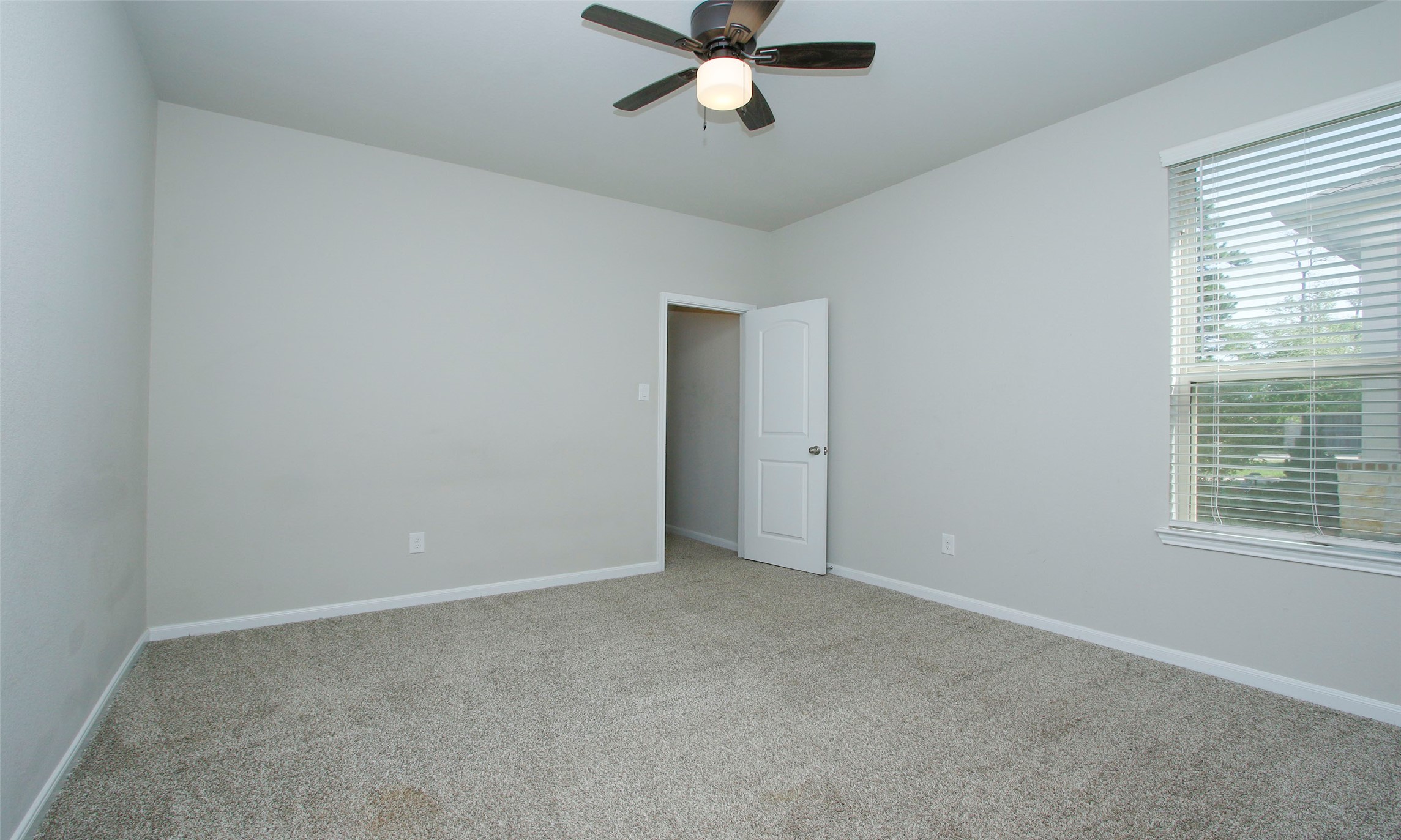 14120 Sand Ridge Court Conroe, TX 77384 - Photo 26 of 43 a view of an empty room with a window