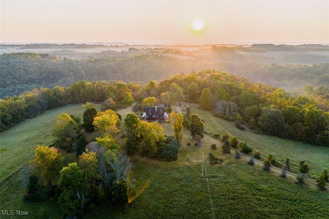 5991 Sandy Ridge Road Southeast Tippecanoe, OH 44699 - Photo 5 of 34 Aerial view of property's location with a forest and a large body of water