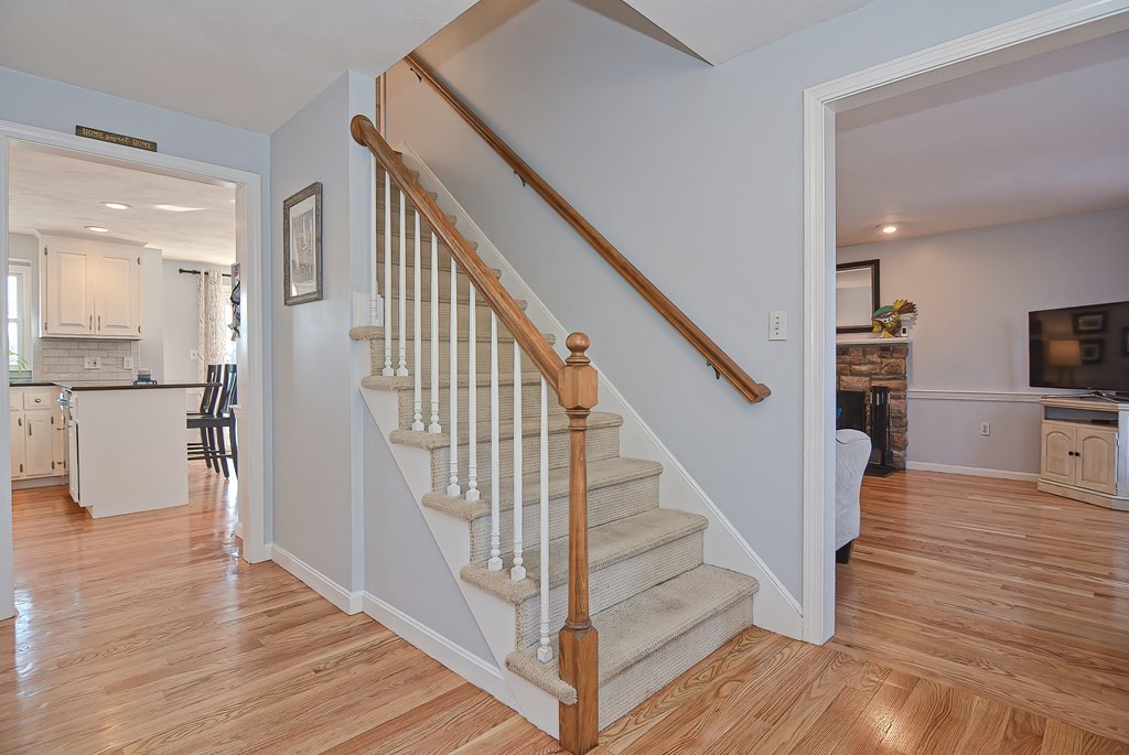 3 Jackson Circle Franklin, MA 02038 - Photo 2 of 25 a view of entryway and hall with wooden floor