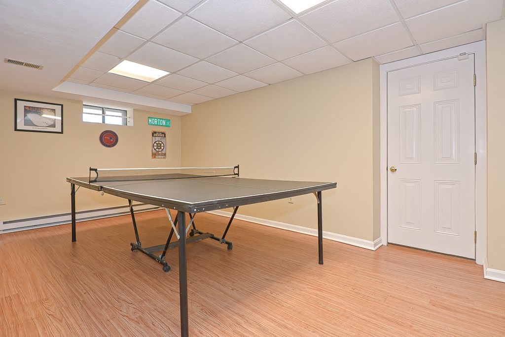 3 Jackson Circle Franklin, MA 02038 - Photo 23 of 25 a view of a livingroom with furniture and wooden floor