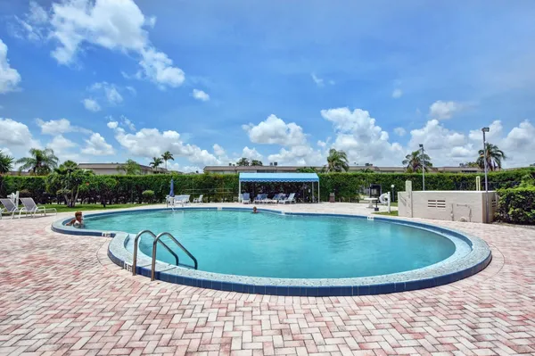 a view of a swimming pool with outdoor space