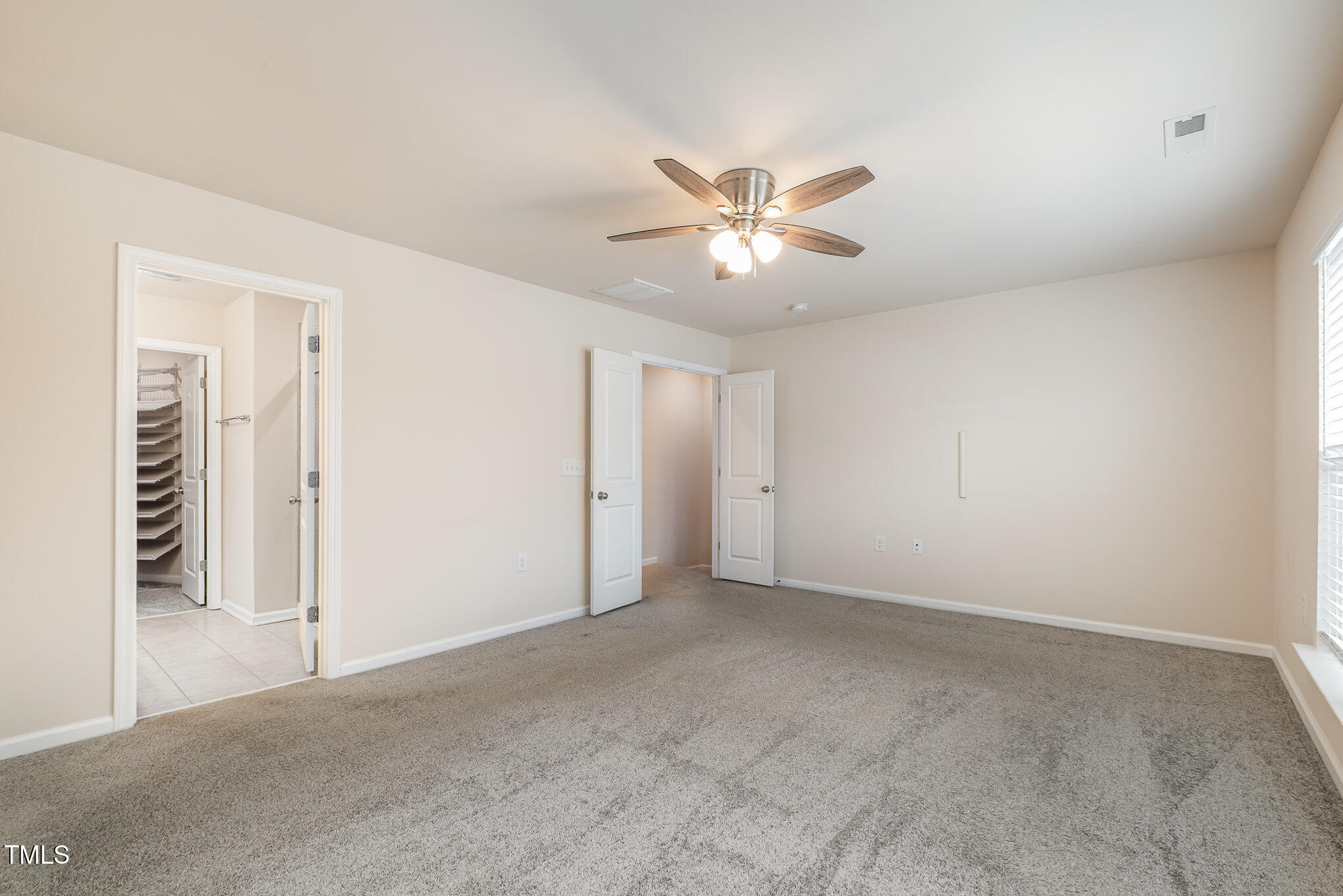 4220 Congleton Place Durham, NC 27703 - Photo 15 of 35 a view of an empty room with a fan