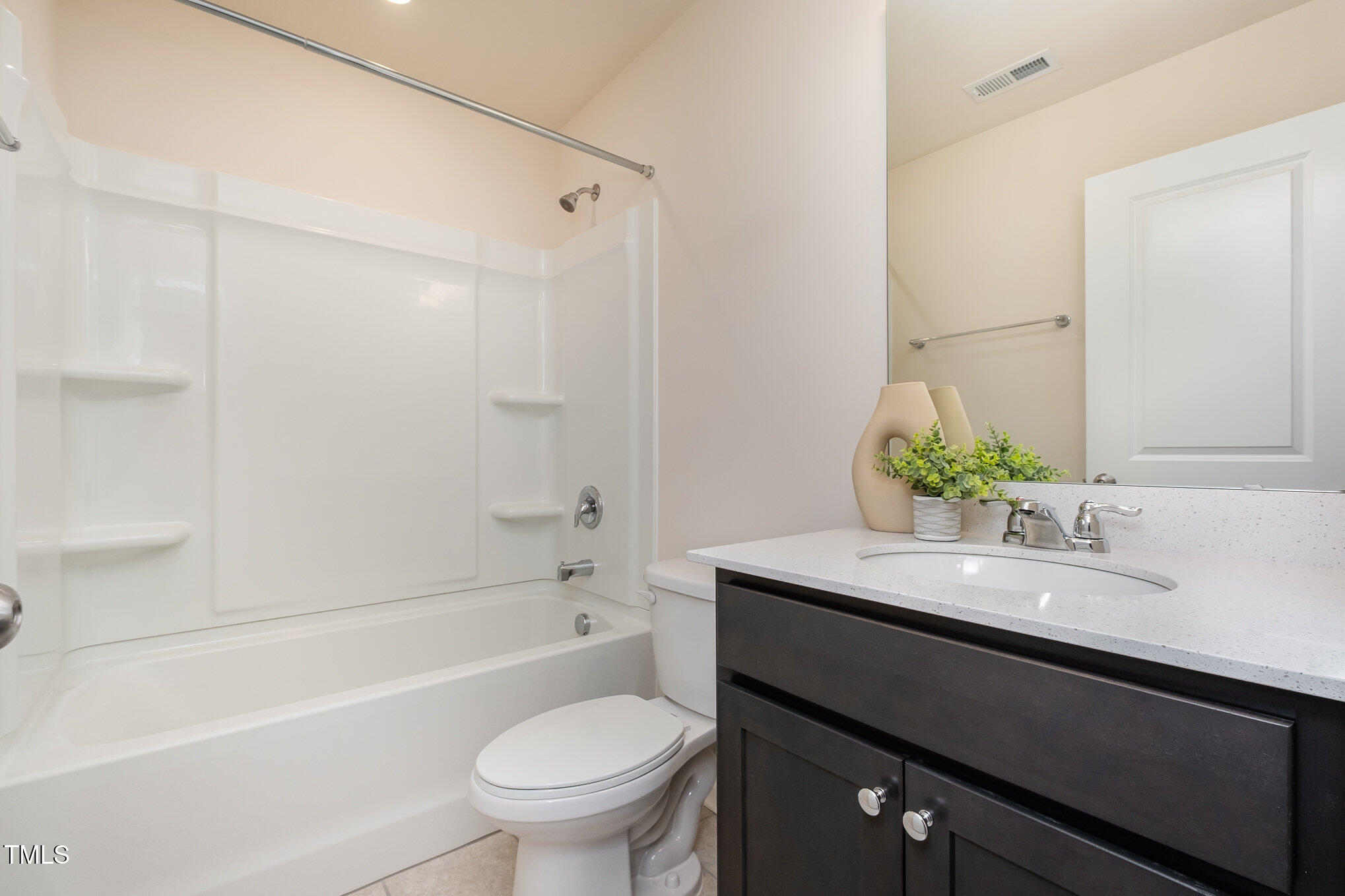 4220 Congleton Place Durham, NC 27703 - Photo 23 of 35 a bathroom with a sink a toilet and a bathtub
