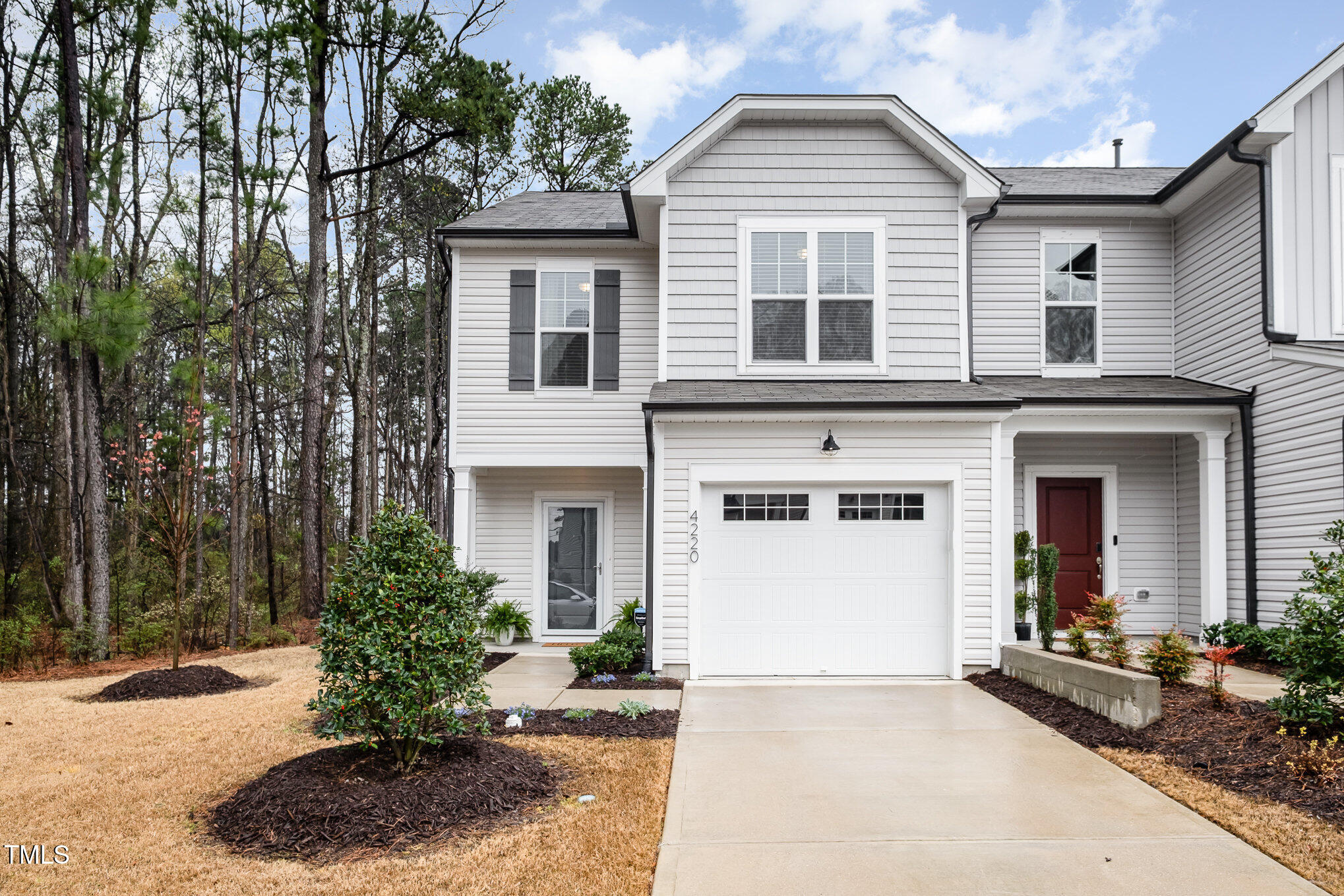 4220 Congleton Place Durham, NC 27703 - Photo 4 of 35 a front view of a house with a yard