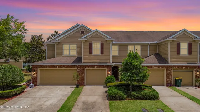 a front view of a house with yard