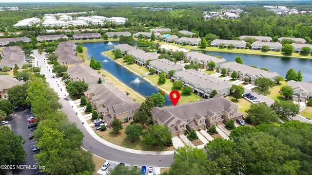 an aerial view of a house with a garden