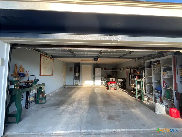 a view of a garage with storage