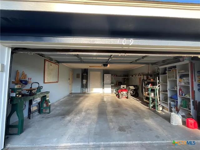 a view of a garage with storage