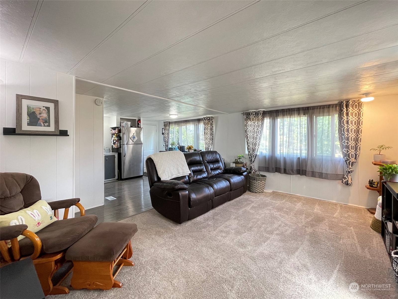 277 House Road Sequim, WA 98382 - Photo 14 of 40 a living room with furniture and a window