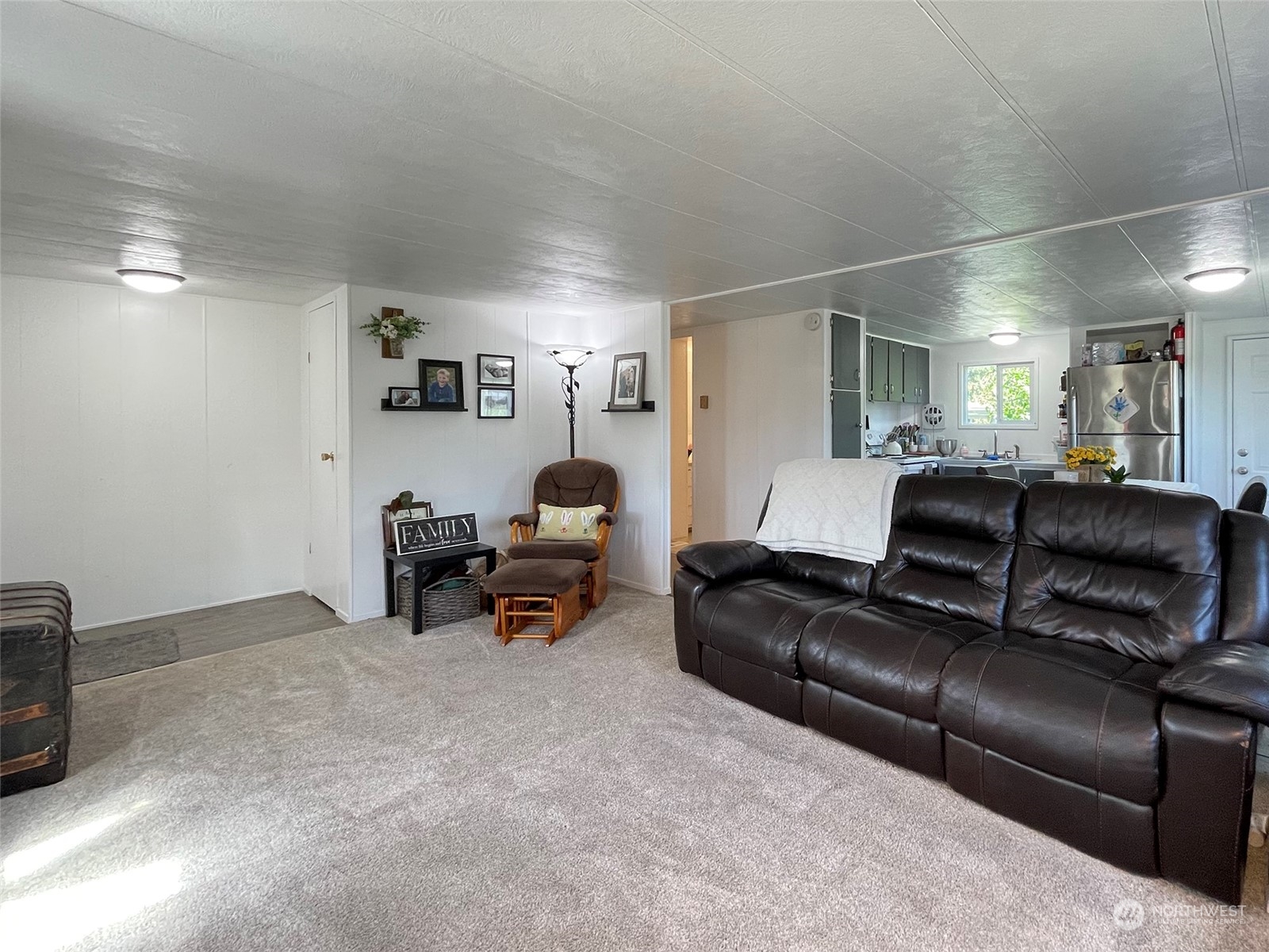 277 House Road Sequim, WA 98382 - Photo 17 of 40 a living room with furniture and a couch