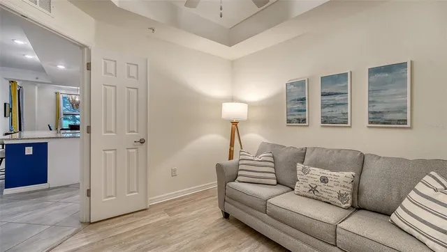 a view of a dining room with furniture window and chandelier
