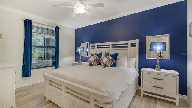 a bathroom with a granite countertop sink a mirror and a shower