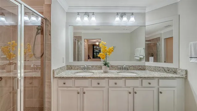a bathroom with a bathtub and a shower