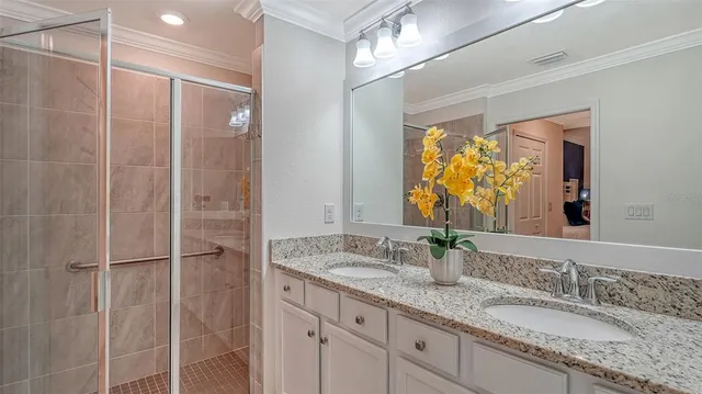 a view of a house with a flower garden