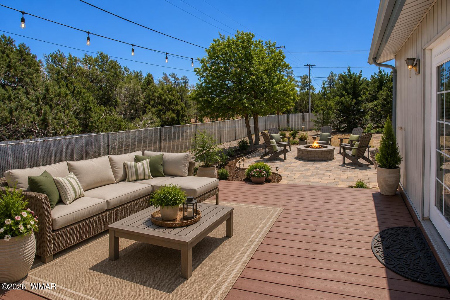 411 West Stratton Show Low, AZ 85901 - Photo 24 of 47 a view of a patio with couches and potted plants
