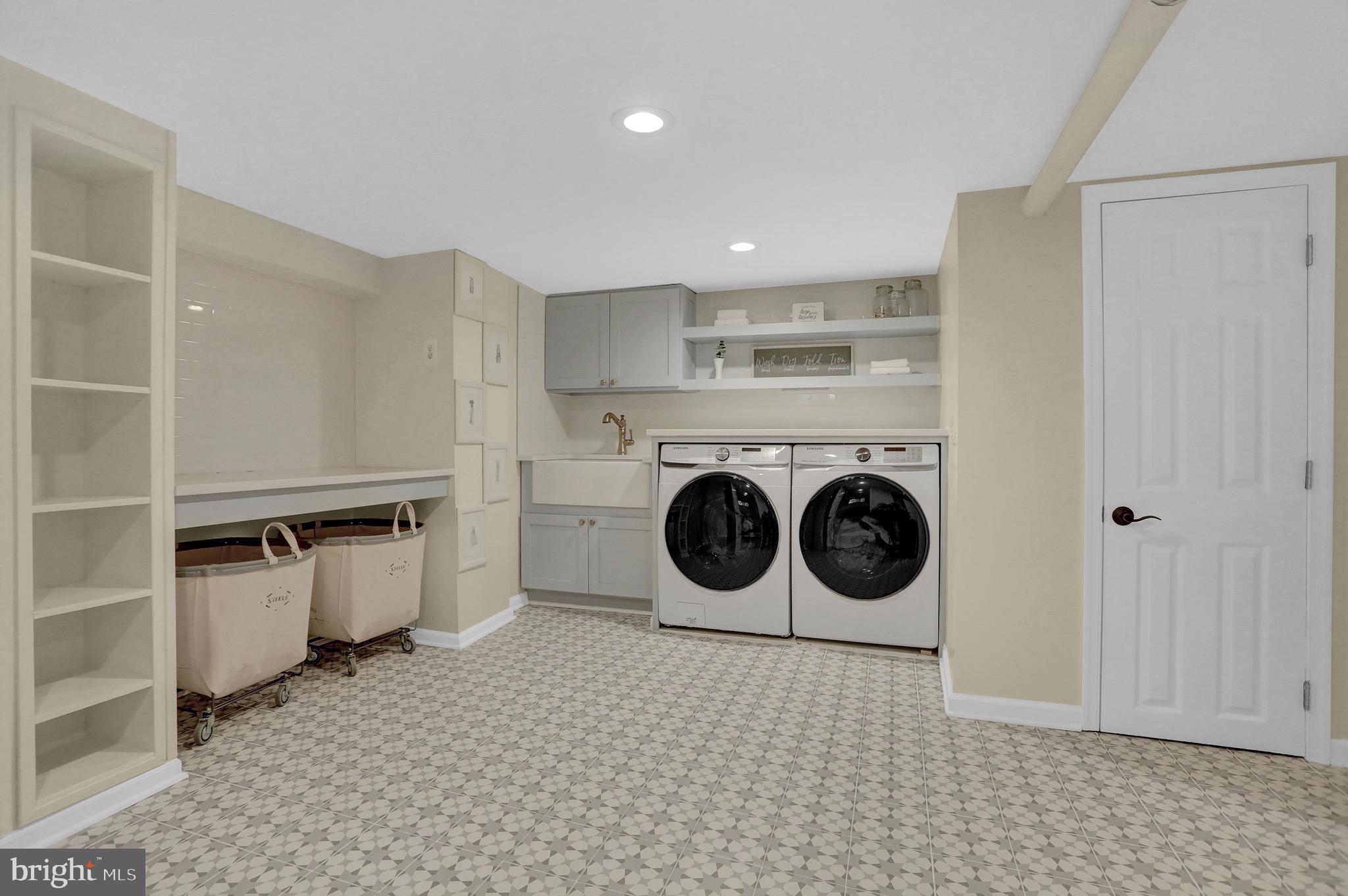116 Edgewood Road Towson, MD 21286 - Photo 42 of 53 laundry room with storage and quartz countertops