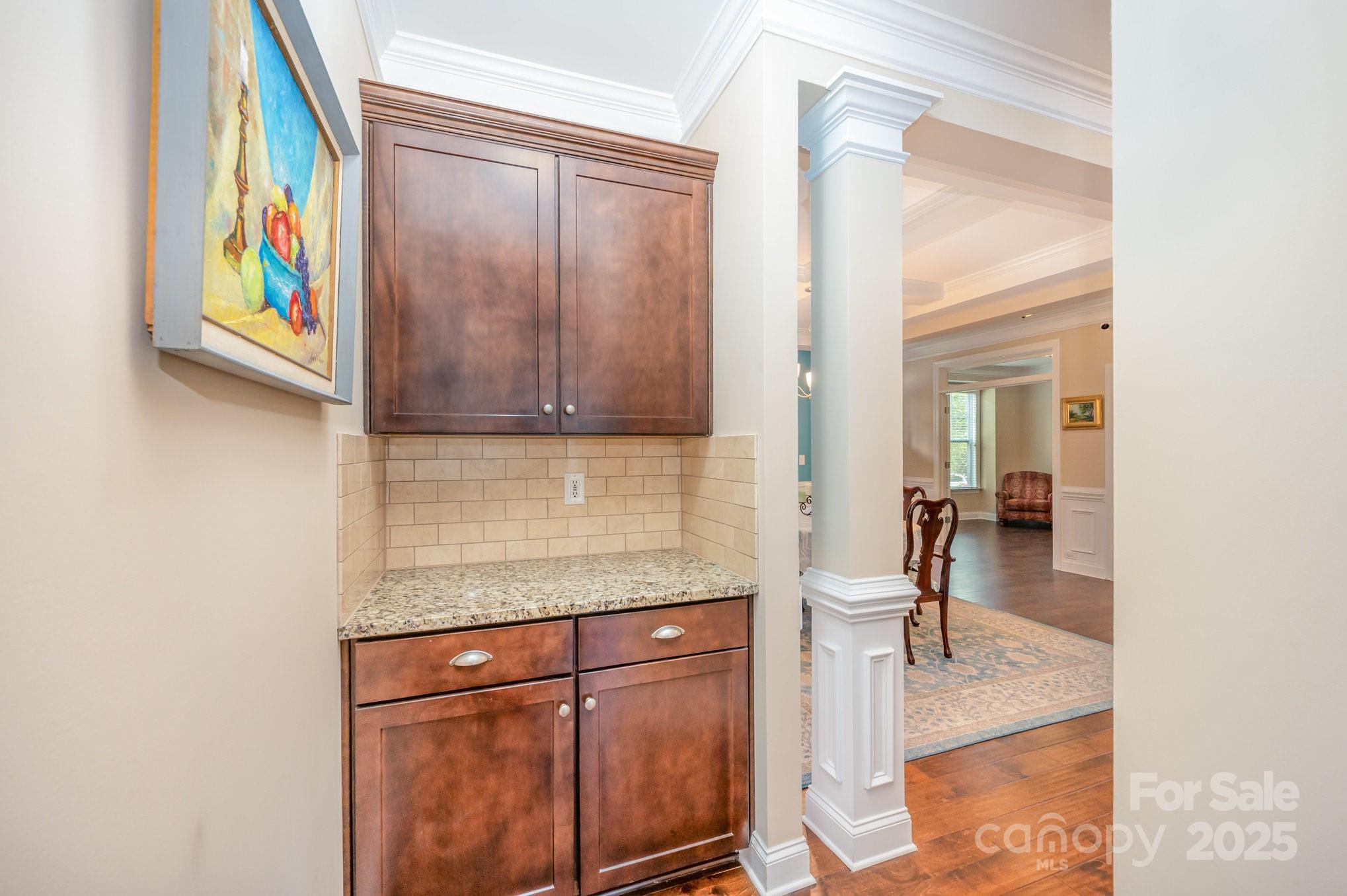 819 Coralbell Way Tega Cay, SC 29708 - Photo 11 of 33 a kitchen with stainless steel appliances granite countertop a sink and a refrigerator