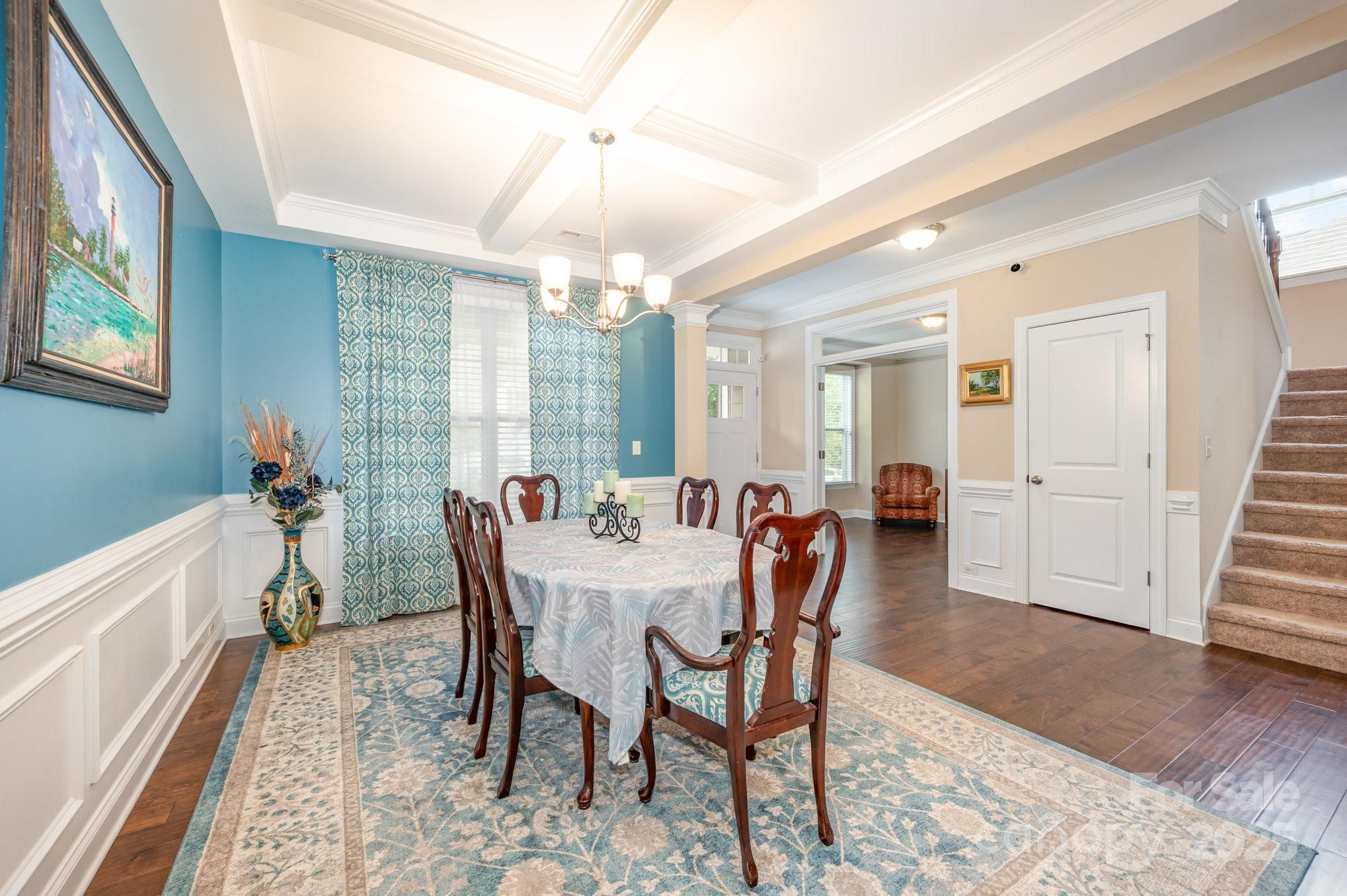 819 Coralbell Way Tega Cay, SC 29708 - Photo 7 of 33 a view of a a dining room with furniture window and wooden floor
