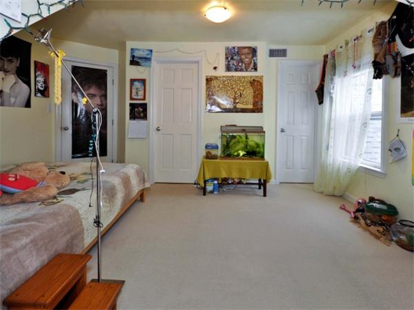 239 Walnut Street, Unit 239 Wellesley, MA 02481 - Photo 16 of 19 a living room with furniture gym equipment and a table