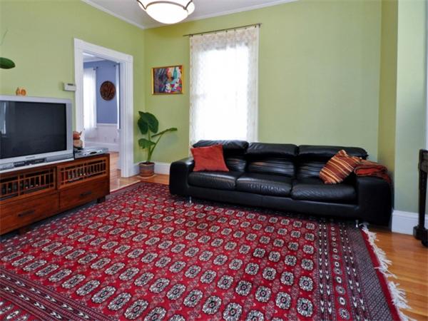 239 Walnut Street, Unit 239 Wellesley, MA 02481 - Photo 7 of 19 a living room with furniture and a flat screen tv