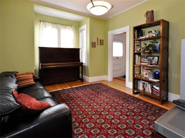 239 Walnut Street, Unit 239 Wellesley, MA 02481 - Photo 8 of 19 a living room with furniture a rug and a window
