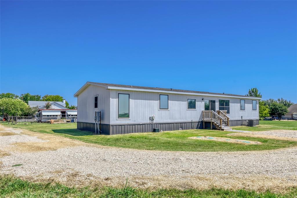 626 Epps Road Palmer, TX 75152 - Photo 27 of 27 Single-story property with light-colored siding and dark trim