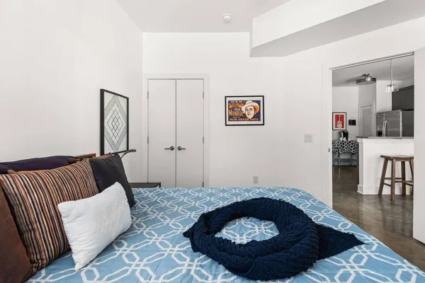 a living room with furniture and a rug